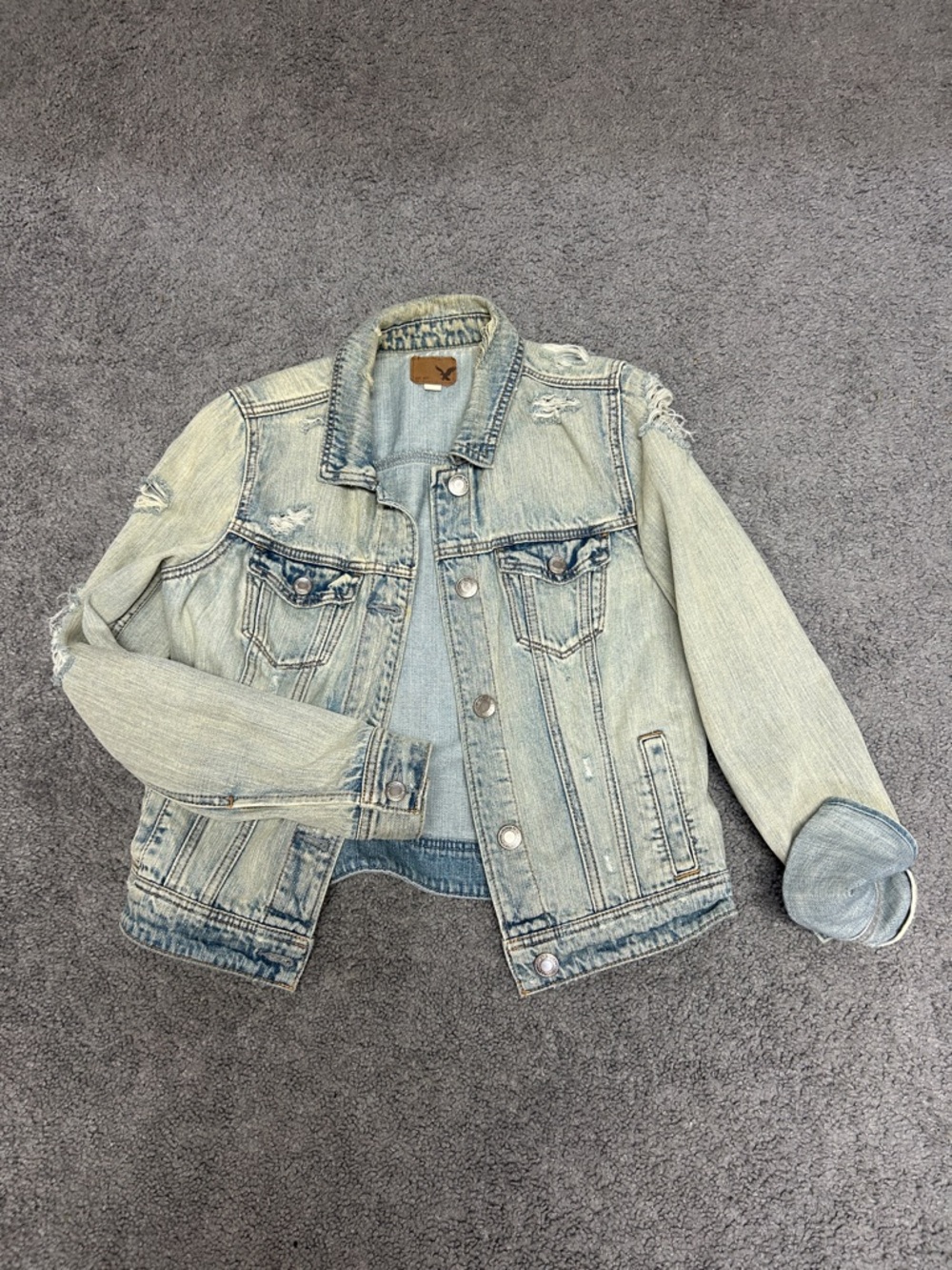 American Eagle light wash distressed denim jacket